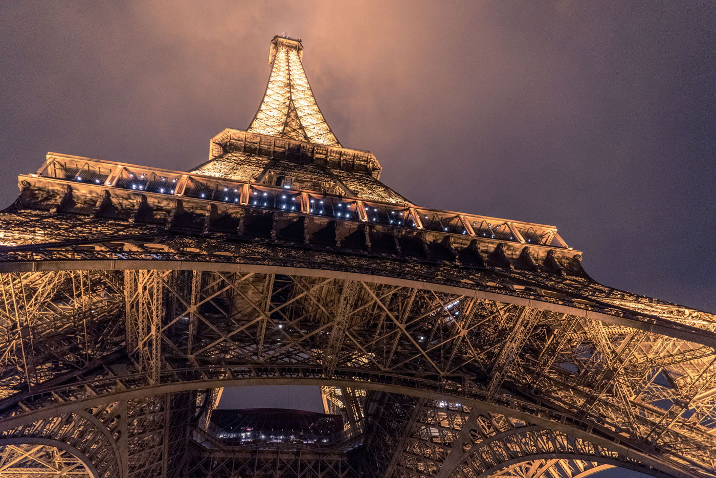 The Eiffel Tower illuminated at night in Paris